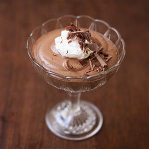 Mousse au chocolat with cream and chocolate shavings