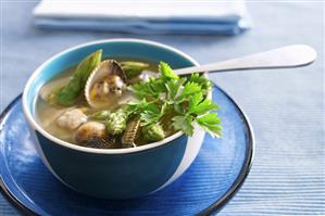Shellfish soup with green asparagus