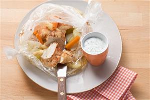 Chicken with spring vegetables cooked in roasting bag