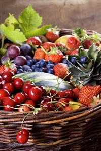 Fresh fruit and berries in a basket