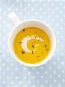 Pumpkin soup in cup from above