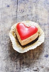 Heart-shaped petit four in paper case