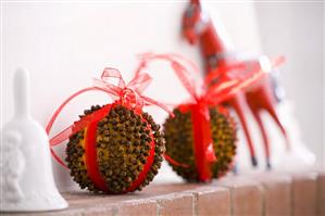 Oranges studded with cloves