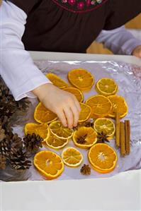 Christmas pot-pourri with dried orange slices etc.