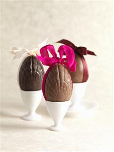 Chocolate eggs with bows