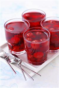 Cherry compote in four glasses