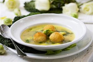 Brussels sprout soup with cheese potato balls
