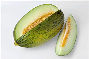 La Granata melon with a section removed