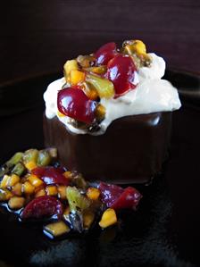 Chocolate cake with fruit and cream
