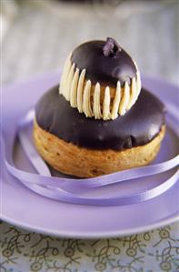 Small blackcurrant cake with chocolate icing