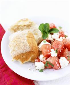 Feta and watermelon salad with bread roll