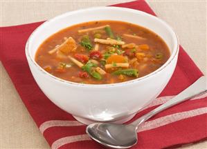 Minestrone in white soup bowl