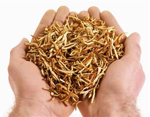 Hands holding dried orange peel