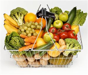 Shopping basket full of fruit and vegetables