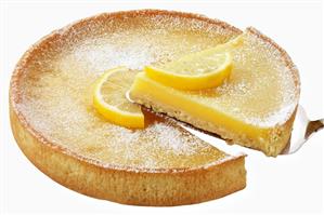 Lemon tart, a piece cut