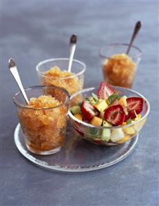 Fruit salad and herbal liqueur granita in three glasses