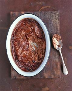 Oven-baked chocolate rice pudding in a baking dish