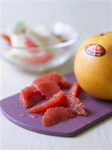 Grapefruit segments and whole grapefruit