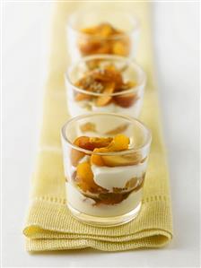 Apricot and yoghurt dessert in three glasses