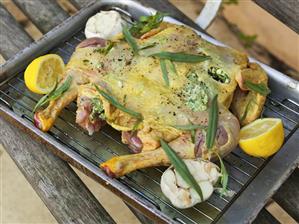 Lemon chicken prepared for roasting on a roasting tray