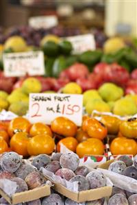 Various exotic fruits on a market stall