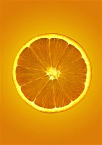 Slice of orange against orange background