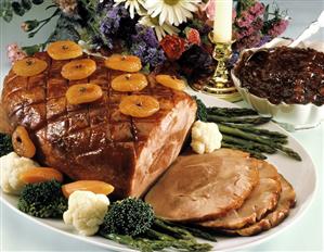 Whole Honey Glazed Ham on Platter with Vegetables