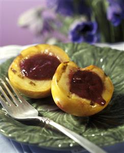 Grilled Nectarines on a Plate with a Fork