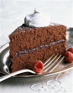 A Slice of Chocolate Raspberry Cake with Whipped Cream