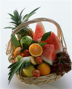 Still Life of Many Assorted Fruit in a Basket