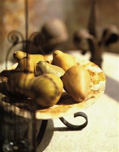 Several Bosc Pears on a Plate