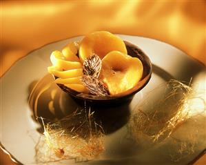 Poached Peaches in Chocolate Cup; Spun Sugar