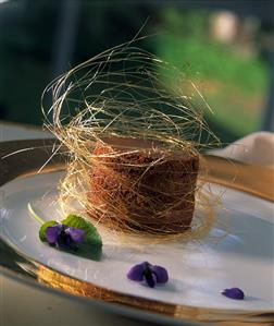 Layered Chocolate Mousse Cake Topped with Spun Sugar