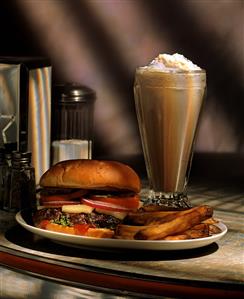 Cheeseburger with Fries and a Chocolate Milkshake