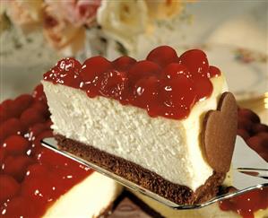 Cheesecake with cherries and chocolate heart