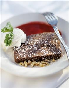 A Brownie with Raspberry Sauce & Whipped Cream