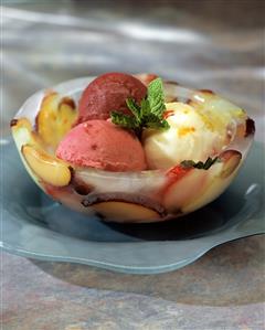 Assorted Sorbet Scoops in Frozen Fruit Bowl