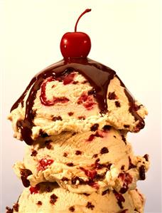 Chocolate chip ice cream with raspberry, hot fudge and a cherry