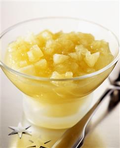 Apple compote in glass bowl