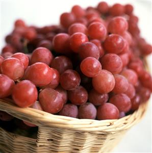 Red grapes in a wicker basket