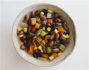 Bowl of Minestrone Soup From Above on a White Background