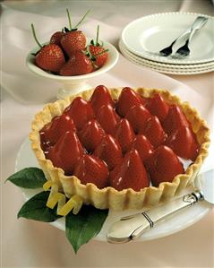 Strawberry tart on cake plate