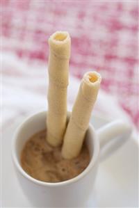 A Mug of Hot Chocolate with Strawberry Cookies