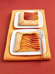 Two Slices of Nectarine Galette on Plates