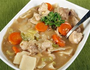 Chicken soup with noodles and carrots