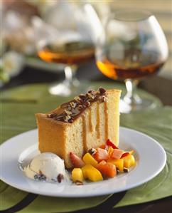 Slice of Rum Cake with Rum Raisin Ice Cream and Island Fruit