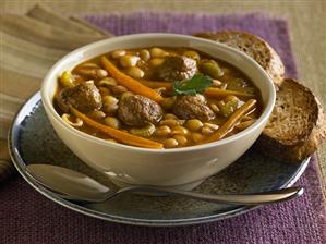 Turkey Meatball and White Bean Soup in a Bowl; Two Slices of Bread