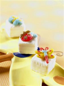 Three Mascarpone Petit Fours with Candy Insects in Dragonfly Dish