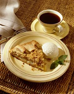 Slice of Apple Pie with Vanilla Ice Cream and Cup of Coffee