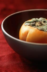 Persimmon in a Bowl